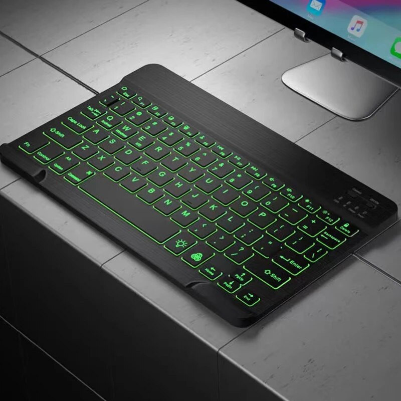 Bezvadu Bluetooth tastatūra Dažādu stilu planšetdatoriem Magnētiskā sūkšanas vadība Universāls septiņu krāsu fona apgaismojums