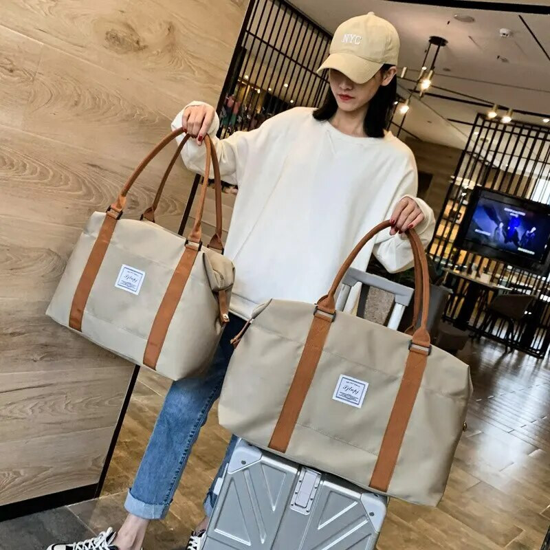 1 gab ceļojumu somas Unisex lielas ietilpības ūdensnecaurlaidīgas rokassomas, pārnēsājamas bagāžas glabāšanai biznesa braucienos