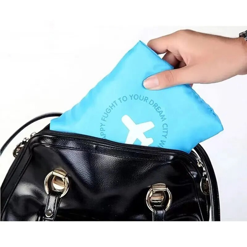 Jauna modes ūdensnecaurlaidīga ceļojumu soma liela ietilpības soma sievietēm neilona salokāmas unisex bagāžas ceļojumu rokassomas