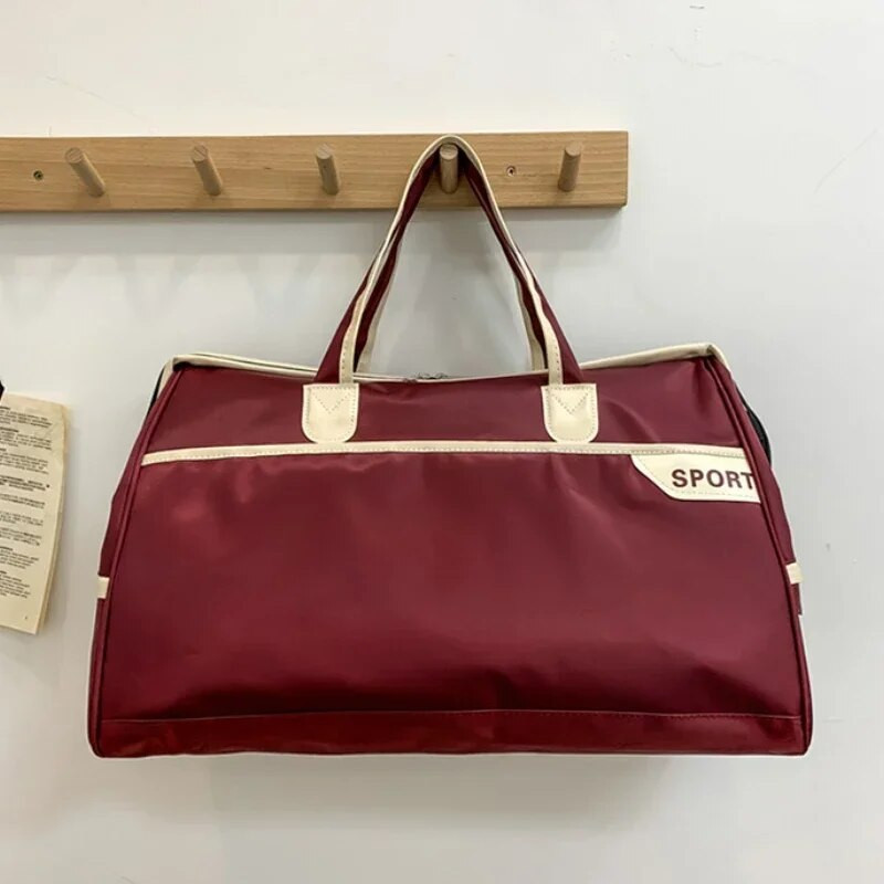 Vienkārša lielas ietilpības ceļojumu biznesa ceļojumu pārnēsājama rokassomiņa vīriešiem sievietēm Jauna neilona ūdensnecaurlaidīga plecu bagāžas soma uzglabāšanas soma