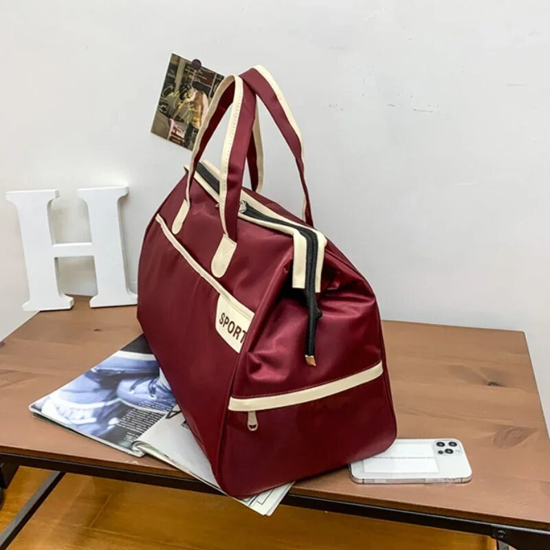 Vienkārša lielas ietilpības ceļojumu biznesa ceļojumu pārnēsājama rokassomiņa vīriešiem sievietēm Jauna neilona ūdensnecaurlaidīga plecu bagāžas soma uzglabāšanas soma