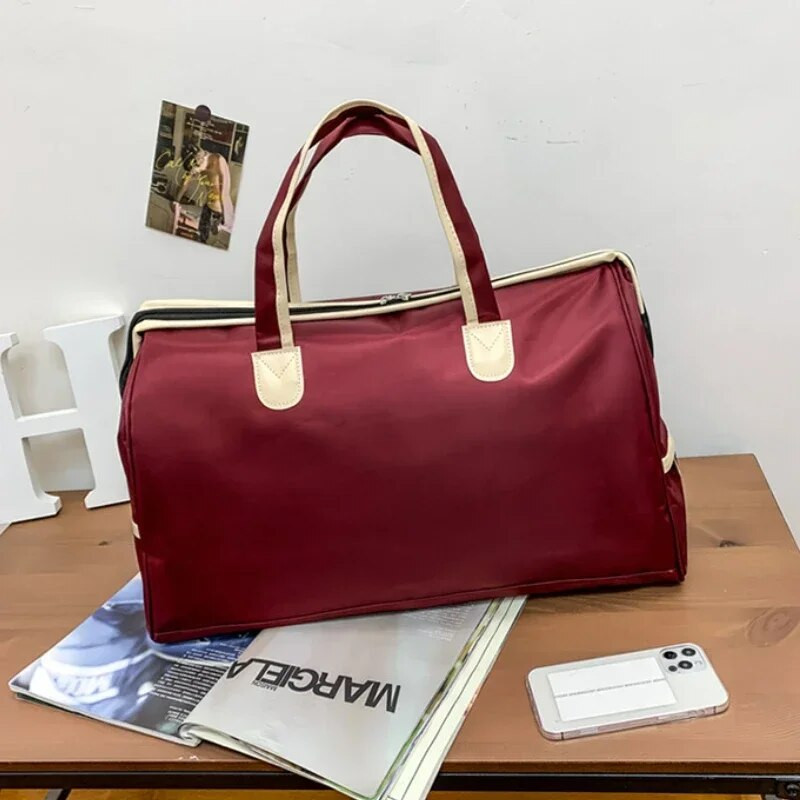 Vienkārša lielas ietilpības ceļojumu biznesa ceļojumu pārnēsājama rokassomiņa vīriešiem sievietēm Jauna neilona ūdensnecaurlaidīga plecu bagāžas soma uzglabāšanas soma