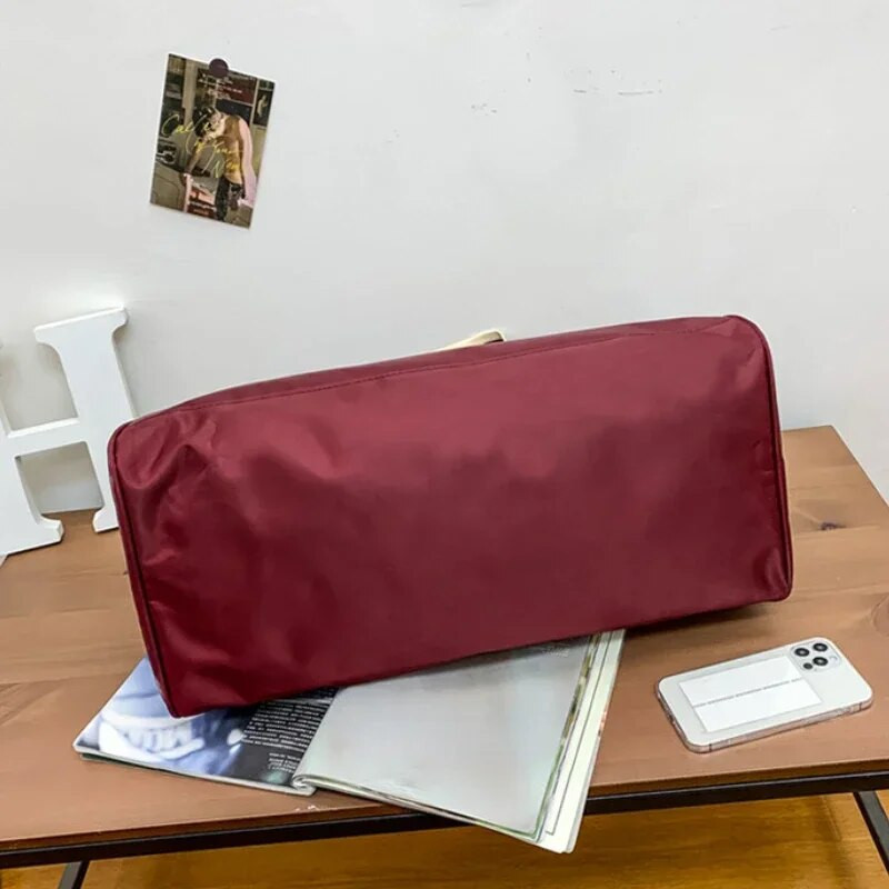 Vienkārša lielas ietilpības ceļojumu biznesa ceļojumu pārnēsājama rokassomiņa vīriešiem sievietēm Jauna neilona ūdensnecaurlaidīga plecu bagāžas soma uzglabāšanas soma