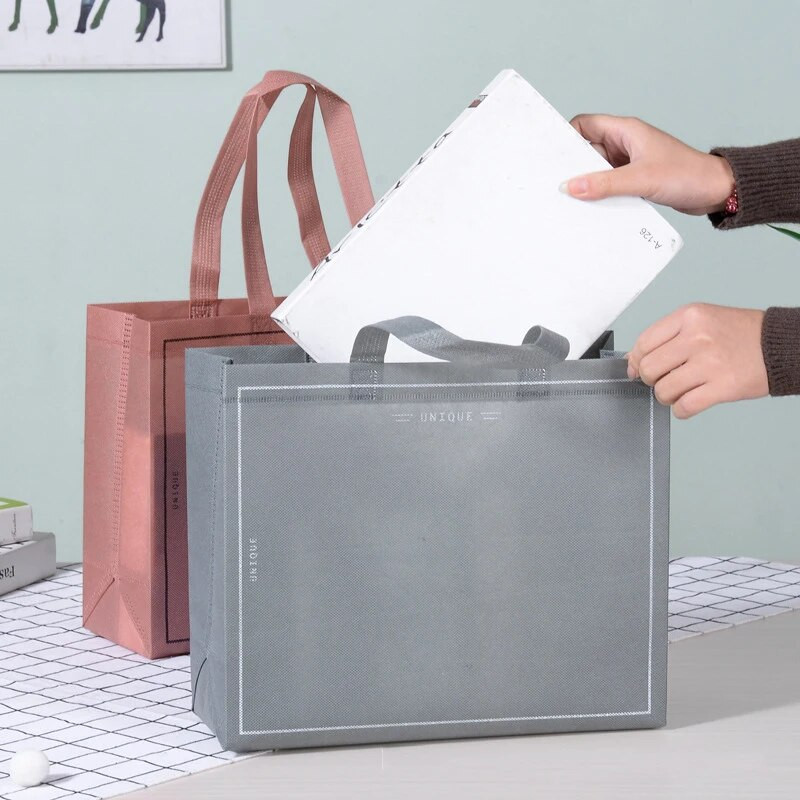 Universāla salokāma neausta rokassomu iepirkumu soma Vienkrāsaina glabāšanas soma dāvanu soma Videi draudzīga soma Liela ietilpība