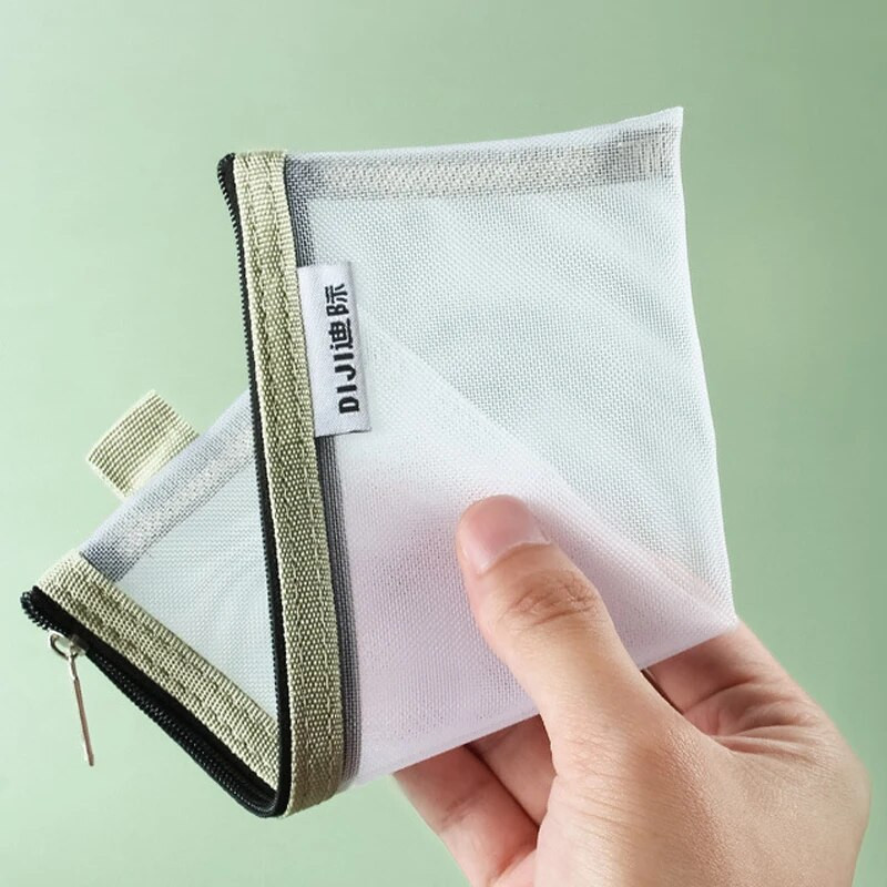 Vienkāršs caurspīdīgs sietveida zīmuļu futrālis Biroja studentu penāļi Skolas piederumu pildspalvu kastītei