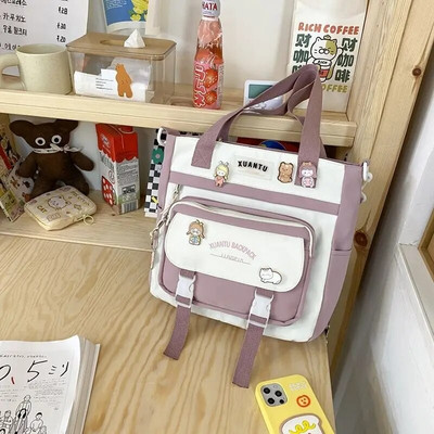 Õpetuskotid Naiste kolledži üliõpilaste lõuendist käekotid ülikoolilinnakus õppimiseks ja klassiruumi moe jaoks Korea versioon Crossbody kott