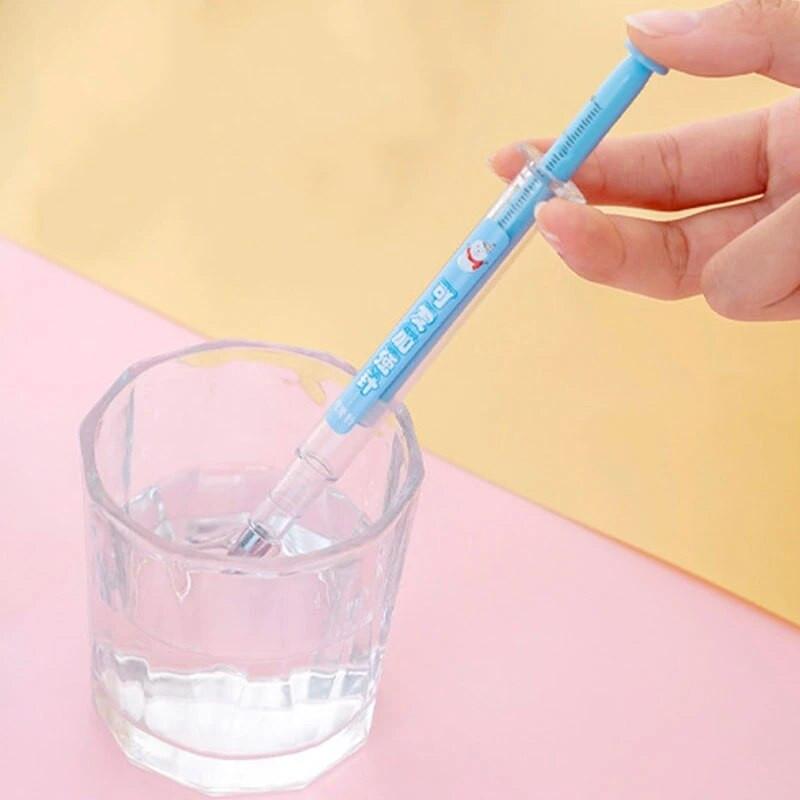 6 gab. Vakcīnas formas gēla pildspalvas Adata šļirce Gēla pildspalva paraksta pildspalvas 0,5 mm melnas tintes lodīšu pildspalva, neitrāla pildspalva, stacionāra