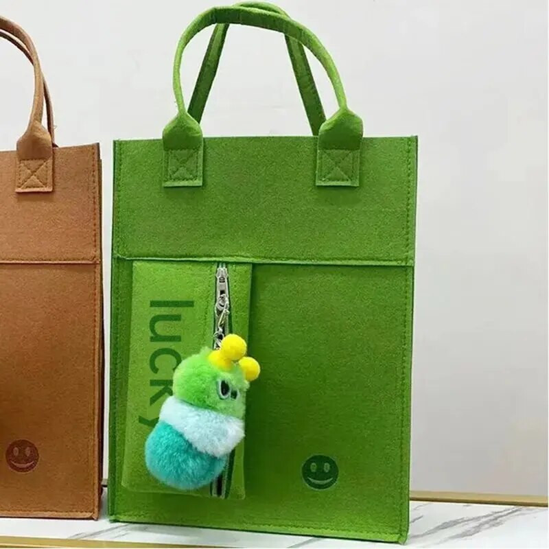 Jaunums, biezināts filcs vienkrāsains tote studentu rokassomiņai liela ietilpība atkārtoti lietojama iepirkšanās rokas rāvējslēdzējs A4 izmēra mācību soma