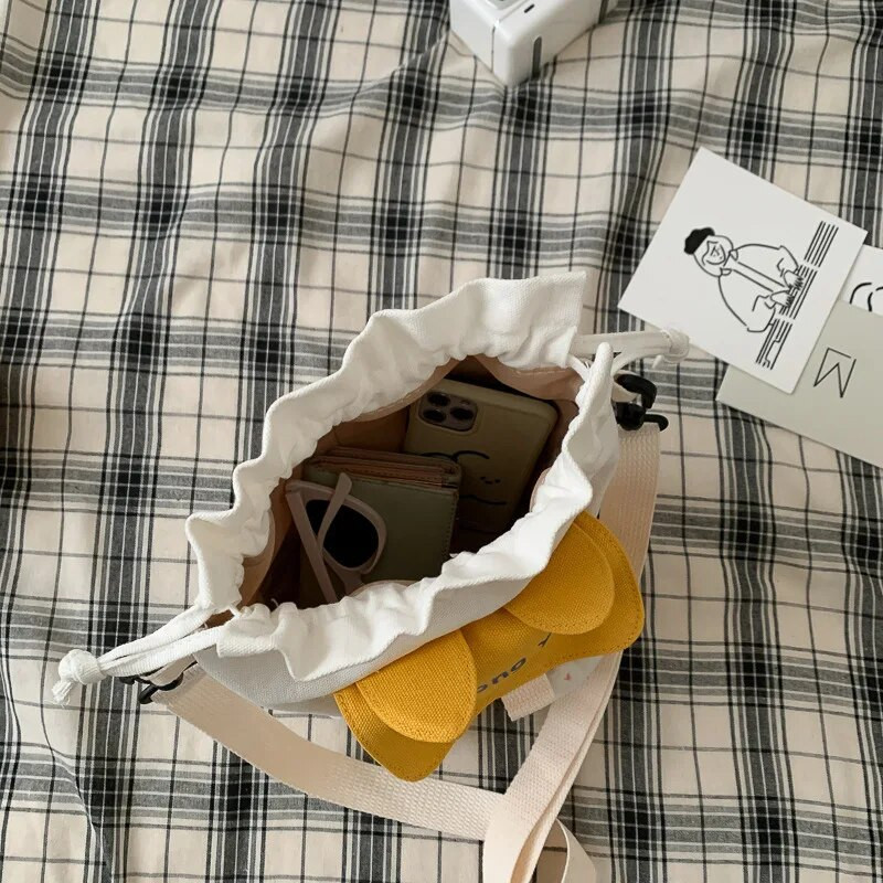 Lõuendist ämbrikott Armsad kotid, uus nööriga kott Korea sisemus Õlakott Saja üliõpilase kott Mobiiltelefonikott Suvine naistekott