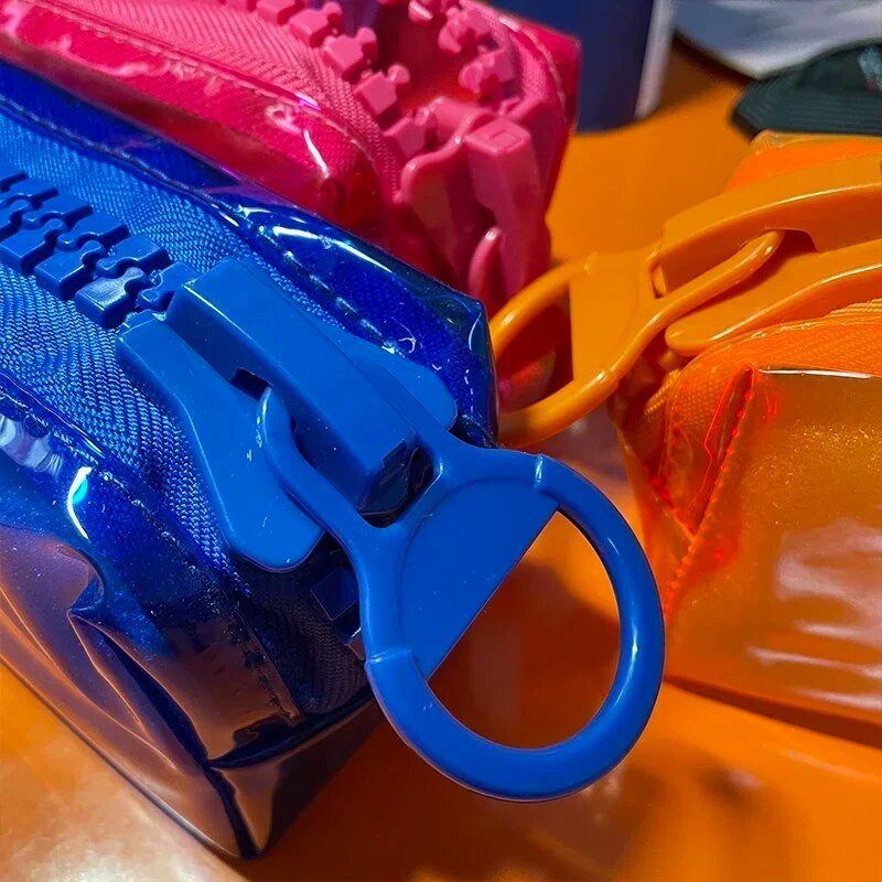 Liels rāvējslēdzēja zīmuļa futrālis, krāsa kvadrātveida liela ietilpība studentu kancelejas piederumi skolas piederumi dienasgaismas caurspīdīgs PVC uzglabāšanas maisiņš