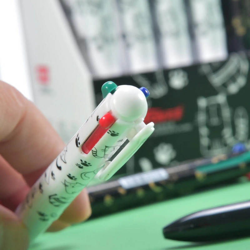 2 gab. 4 vienā četru krāsu melnbaltā kaķa daudzkrāsu lodīšu pildspalva Jauki biroja studentu kancelejas piederumi