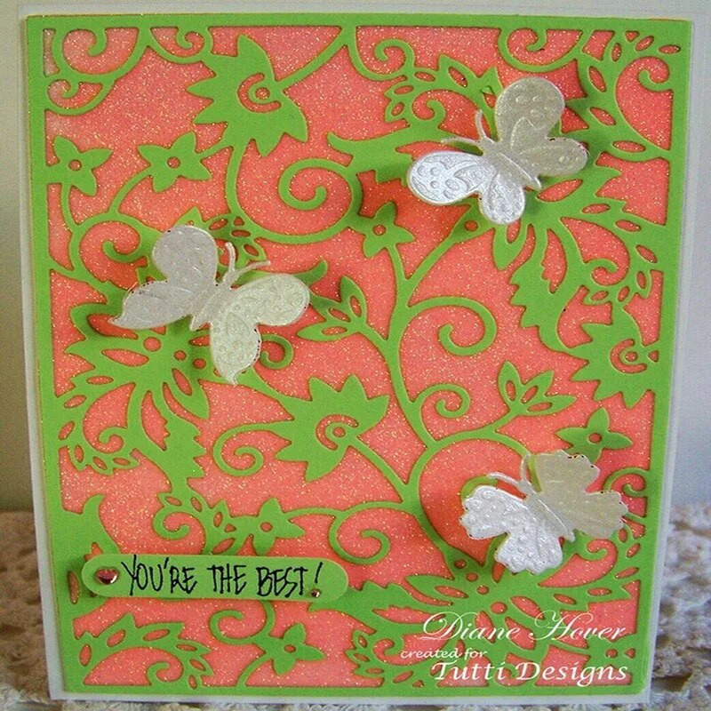 Aia taustal metallist lõikevormid, kaunistused, väljalõigete album, paberist käsitöö nuga, teraga stantsimise šabloonid