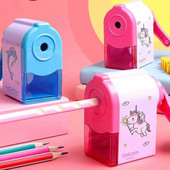 Käsivändaga armas delfiinide mehaaniline teritaja pliiatsi jaoks koolitarvete jaoks. Loomingulised kirjatarbed tagasi lapse kooli