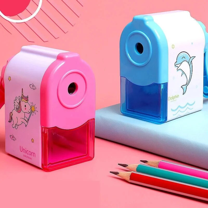 Käsivändaga armas delfiinide mehaaniline teritaja pliiatsi jaoks koolitarvete jaoks. Loomingulised kirjatarbed tagasi lapse kooli