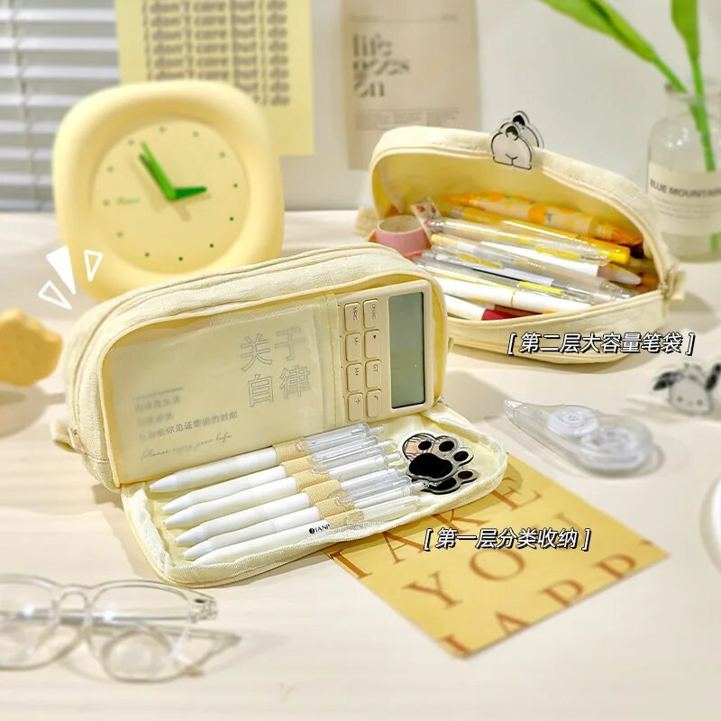 2023. aasta uus pliiatsikott sisaldab lihtsat ruudukujulist ühevärvilist pliiatsikotti, suure mahutavusega kirjatarvete hoiukotti õpilastarbed