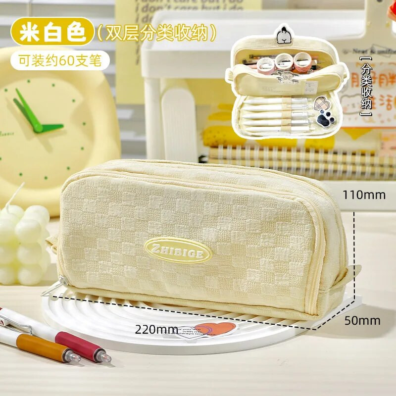 2023. aasta uus pliiatsikott sisaldab lihtsat ruudukujulist ühevärvilist pliiatsikotti, suure mahutavusega kirjatarvete hoiukotti õpilastarbed