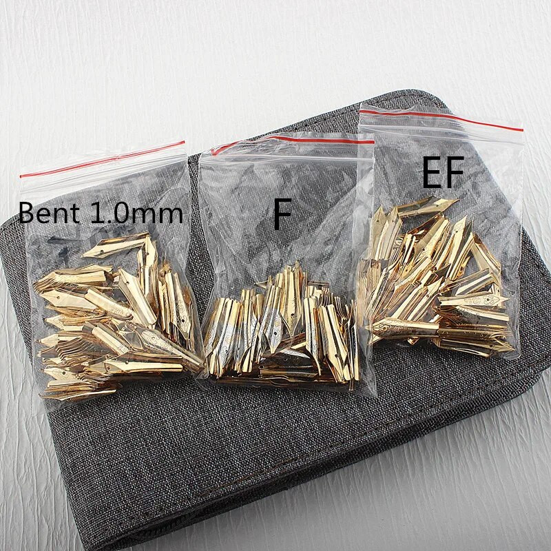 4 tk Hero täitesulepea, 26 otsaga kuldne paljude seeriate jaoks, mida saab vahetada kirjatarbed õpilaste kontoritarbed