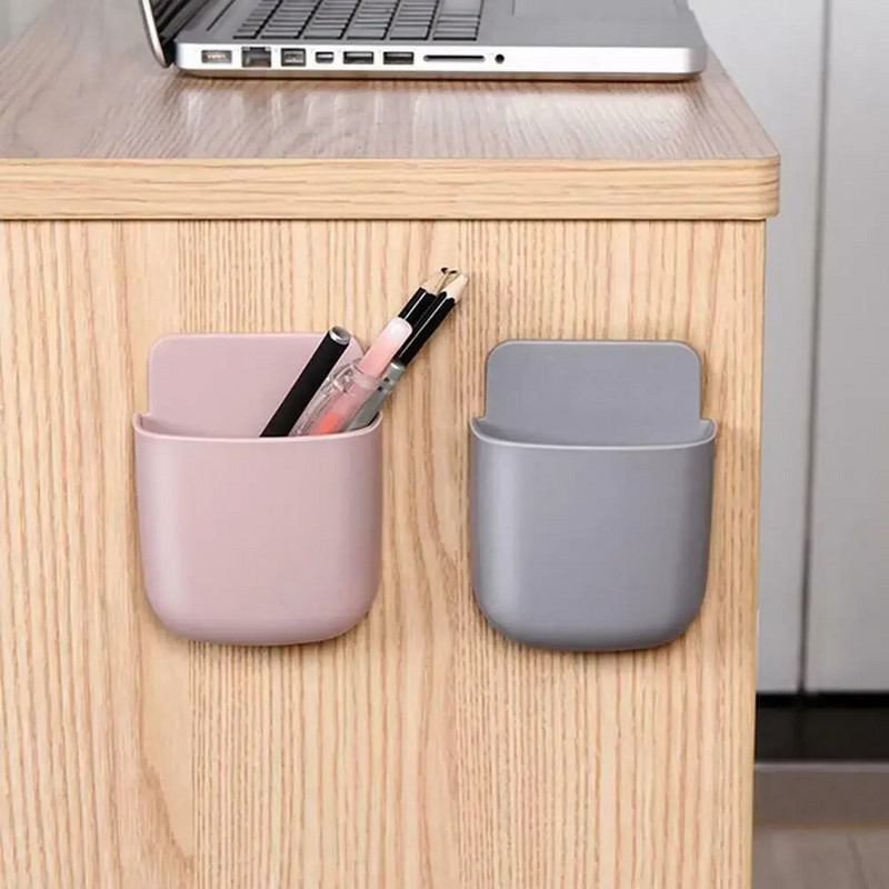 Mājas biroja sienas pašlīmējoša uzglabāšanas kaste gaisa kondicionētājam TV tālvadības pults mobilā tālruņa turētāja pildspalvu organizators