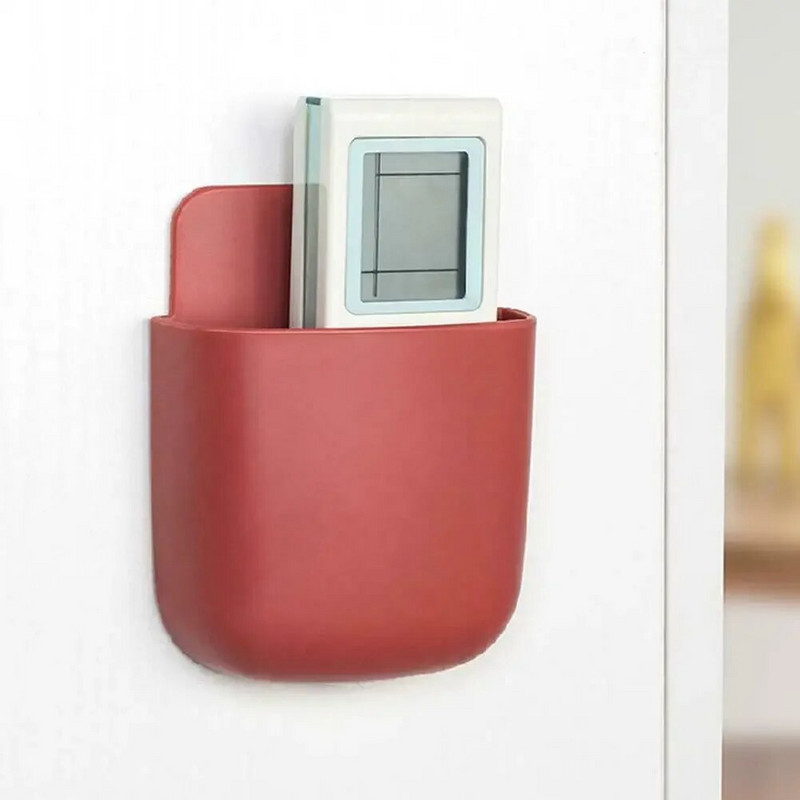 Mājas biroja sienas pašlīmējoša uzglabāšanas kaste gaisa kondicionētājam TV tālvadības pults mobilā tālruņa turētāja pildspalvu organizators