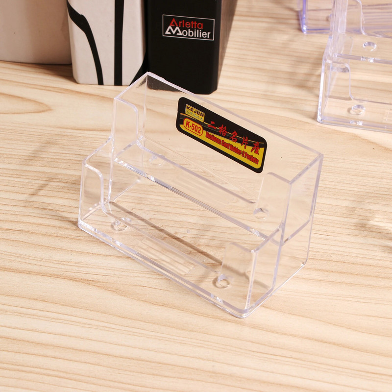 Daudzslāņu caurspīdīgs displeja statīvs galddatora vizītkaršu kaste Īpaša biroja vizītkaršu turētāja rakstāmgalda uzglabāšanas kaste