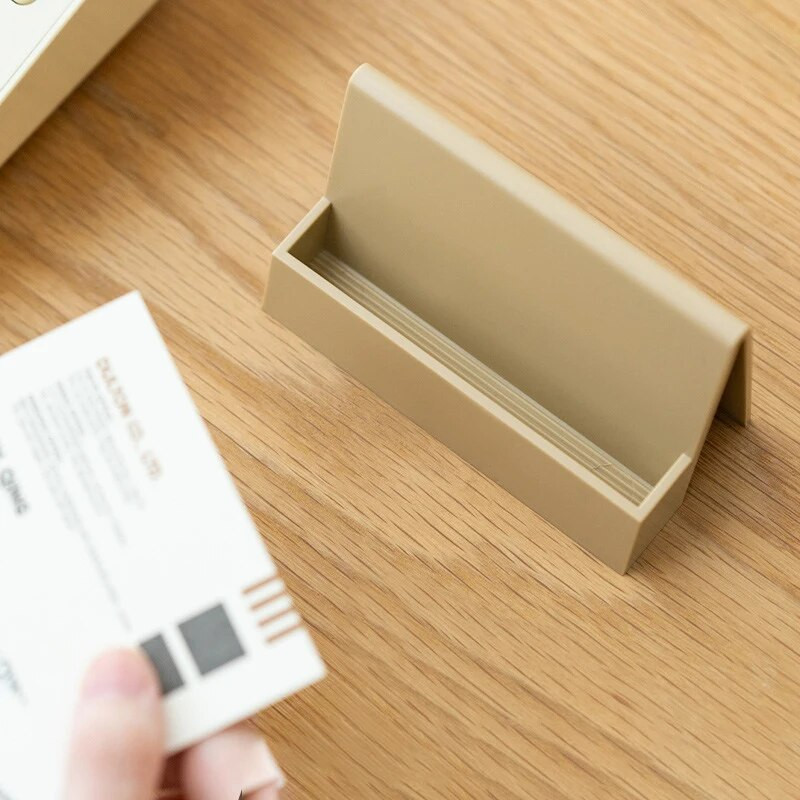 Uzņēmuma nosaukuma glabāšanas karšu displeja statīvs Vizītkaršu turētājs Statīvs karšu kastīte Radoša vienkrāsaina Vienkārša ērta karšu glabāšana