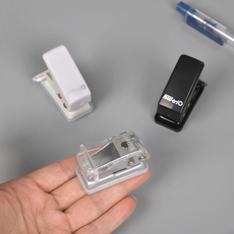 4 mudelit Lihtne mini-ühe paberipuncher Väike värske kaasaskantav kontoriköitmistarbed Ajakirja väljalõigete album Hole Punch Kirjatarbed