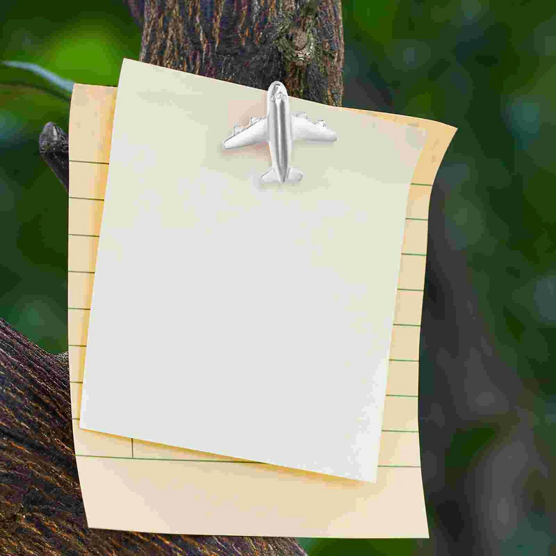 12 tk Metallist surunõelaga lennukikujulised pöidlad Armsad nööpnõelad dekoratiivsed pöidlaküüned