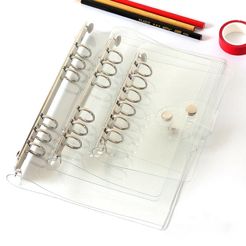 A7 A6 A5 Caurspīdīga vaļēju lapu saistviela piezīmjdatora iekšējā serdeņa vāka piezīmju grāmatiņas žurnālu plānotājs Biroja kancelejas piederumi