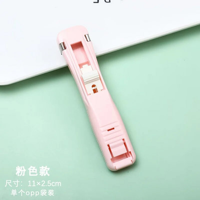 Jauka stūmēja saspraudes rokas papīra griešanas mašīna un uzpilde Metāla skavotāju saspraudes dokumentu iesiešanai Kancelejas piederumi Uzlabots, nebojājams papīrs