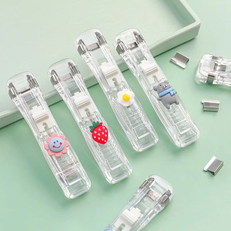 Jauka stūmēja saspraudes rokas papīra griešanas mašīna un uzpilde Metāla skavotāju saspraudes dokumentu iesiešanai Kancelejas piederumi Uzlabots, nebojājams papīrs