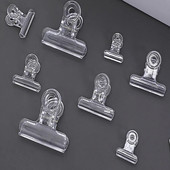 4 gab./komplekts Caurspīdīga iesiešanas mapju klipsis Biroja piederumi Rēķinu papīrs Garās astes saspraudes Dokumenti Failu rādītājs Lapas turētājs Skavas skola