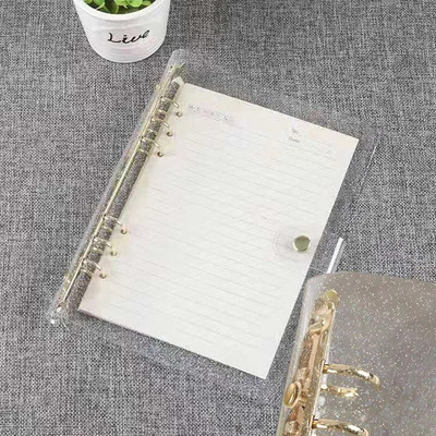 Caurspīdīga PVC mape, grāmatu vāks, atsperu iesiešana ar vaļējām lapām A6 izmērā