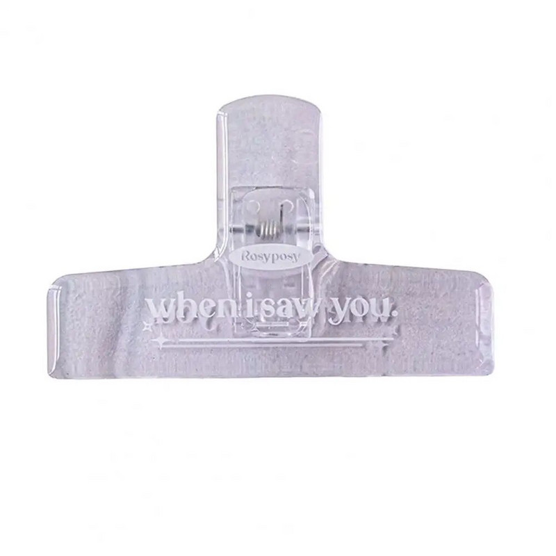 Viegls failu saspraudes, necaurlaidīgs pret kritienu, vietu ietaupaošs albuma vīles skava.