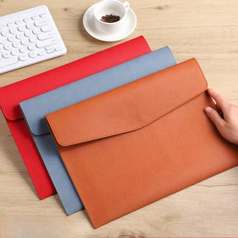 A4 formāta papīra pārnēsājama ādas failu soma Modes failu maisiņa biezināšanas poga Ūdensizturīga biznesa biroja dokumentu glabāšanas pārvaldība