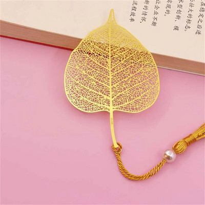 Kullavärvi lehekujulised järjehoidjad tutiga Mood Õõnes lootose kujuga raamatumärgid õpilaste kirjatarbed Kooli kontoritarbed Kingitused