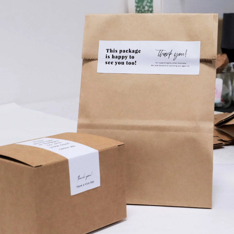 30–60 tk valged tänukleebised väikeettevõttele Sellel pakendil on ka hea meel teid näha.