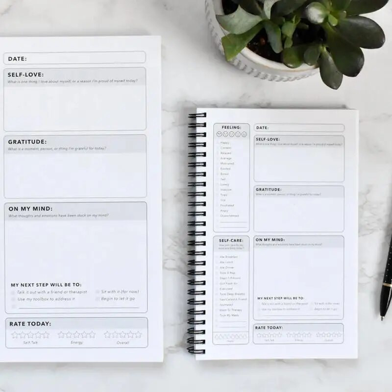 Protas Psichikos sveikatos užrašų knygelė Savidrausmės dienoraštis Padidinkite laimę Sąsiuviniai Savitarnos planavimo priemonė Mokykliniai reikmenys Daugiau laimės