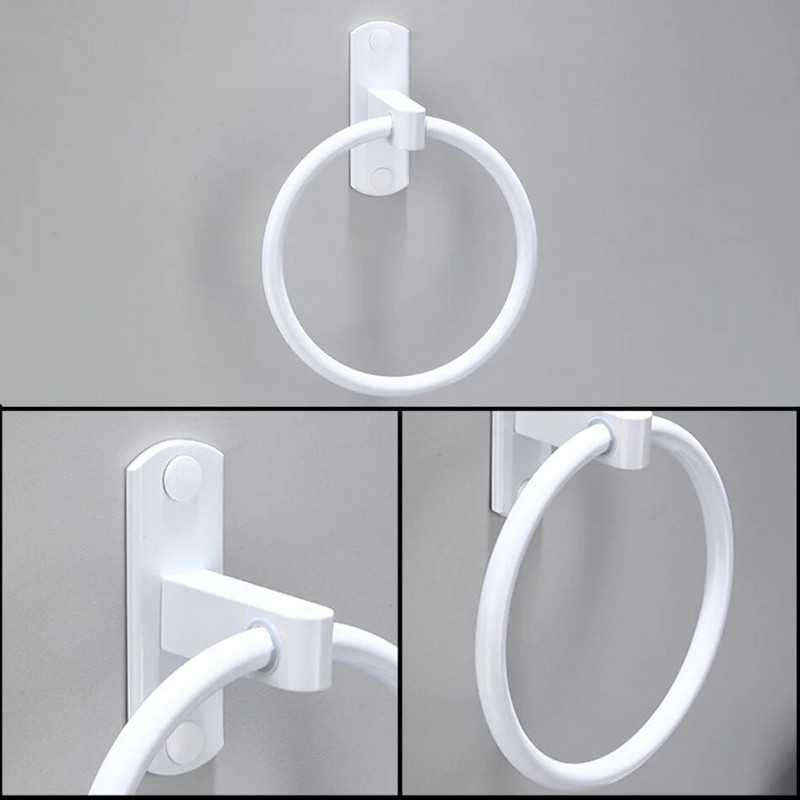 Valge käterätikurõnga ruum, alumiiniumist seinale kinnitatav vannirätikuhoidja, ümmargune riidepuu riiul köögi tualett-vannitoa tarvikutele