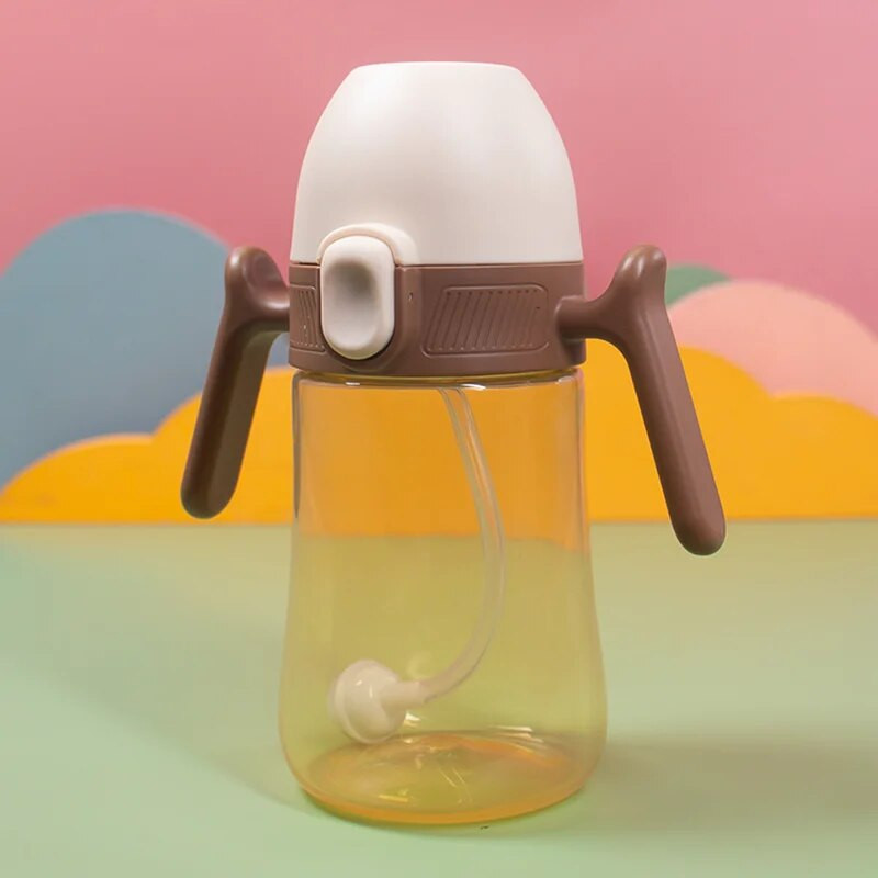1 gab. Bērnu ūdens pudele Pārnēsājami bērnu krūzes Gravitācijas bumba ar rokturi 240ml Noplūdes necaurlaidīgs elastīgs vāks bērnu treniņu ūdens kauss