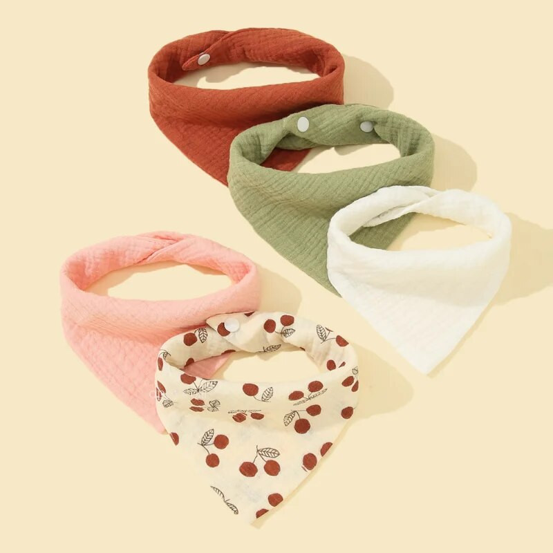 5 tk/komplekt Pehmest puuvillast beebipudipõlled Ühevärvilised beebitoitmispudipõlled Lillelised nööpnööbiga kolmnurkrätik vastsündinu tarvikud