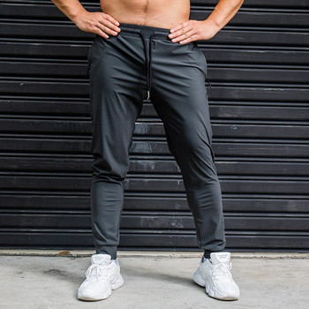 Ανδρικό παντελόνι για τρέξιμο Elasticity Casual φούτερ με τσέπες με φερμουάρ Προπόνηση Τζόκινγκ Παντελόνι γυμναστικής γυμναστική Αθλητικό παντελόνι γυμναστικής