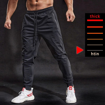 BINTUOSHI Дишащи еластични спортни панталони Мъжки панталони за бягане Джобове с цип Тренировъчни панталони Джогинг Фитнес панталони за мъже