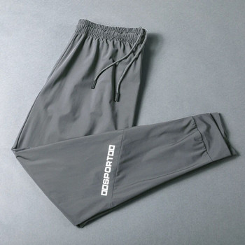 BINTUOSHI Дишащи еластични спортни панталони Мъжки панталони за бягане Джобове с цип Тренировъчни панталони Джогинг Фитнес панталони за мъже