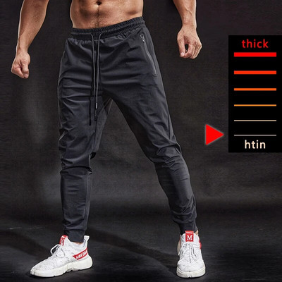 BINTUOSHI Pantaloni de sport elastici respirabili Pantaloni de alergare pentru bărbați buzunare cu fermoar Pantaloni de antrenament Jogging Pantaloni de fitness pentru bărbați