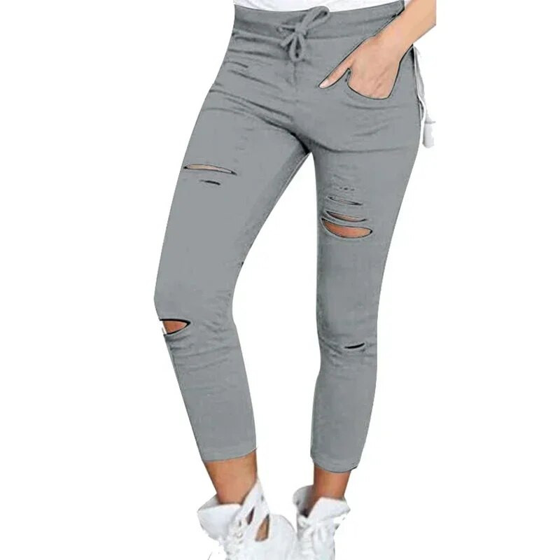 Didelio dydžio vienspalvis raištelis aukštu juosmeniu pieštuku kelnės suplėšytos liesos antblauzdos aukštu juosmeniu pieštukas kelnės suplėšytos liesos antblauzdos