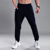 Pantaloni pentru bărbați cu uscare rapidă Pantaloni sport pentru alergare cu buzunare cu fermoar Pantaloni de antrenament pentru jogging Pantaloni casual de fitness