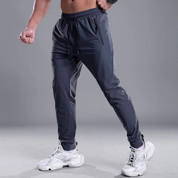 Бързосъхнещи мъжки панталони Спортни панталони за бягане с джобове с ципове Тренировъчни спортни панталони за джогинг Фитнес ежедневни панталони