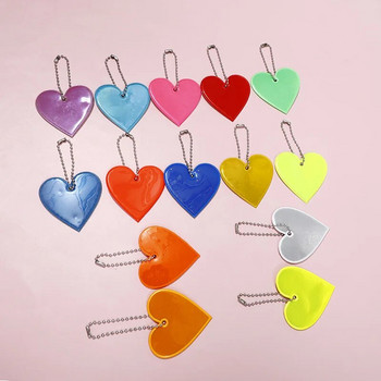 Ανακλαστικό μενταγιόν Τσάντες μπρελόκ σχήμα καρδιάς Αξεσουάρ Ψηλά ορατοί ανακλαστήρες PVC Μπρελόκ Σακίδια πλάτης για γυναικεία Παιδιά Χρηματοκιβώτιο
