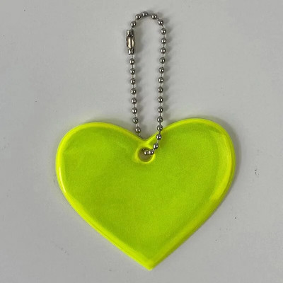 Ανακλαστικό μενταγιόν Τσάντες μπρελόκ σχήμα καρδιάς Αξεσουάρ Ψηλά ορατοί ανακλαστήρες PVC Μπρελόκ Σακίδια πλάτης για γυναικεία Παιδιά Χρηματοκιβώτιο