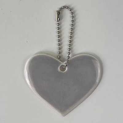 Ανακλαστικό μενταγιόν Τσάντες μπρελόκ σχήμα καρδιάς Αξεσουάρ Ψηλά ορατοί ανακλαστήρες PVC Μπρελόκ Σακίδια πλάτης για γυναικεία Παιδιά Χρηματοκιβώτιο